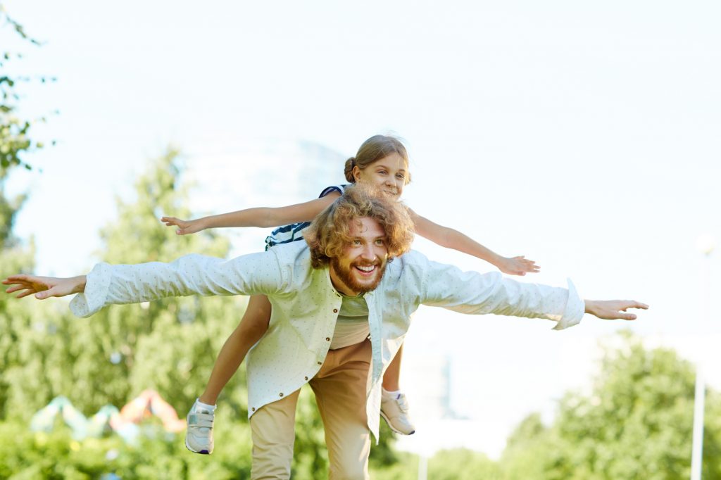 Father playing with daughter