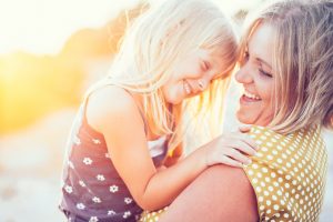 Mom and daughter Smiling